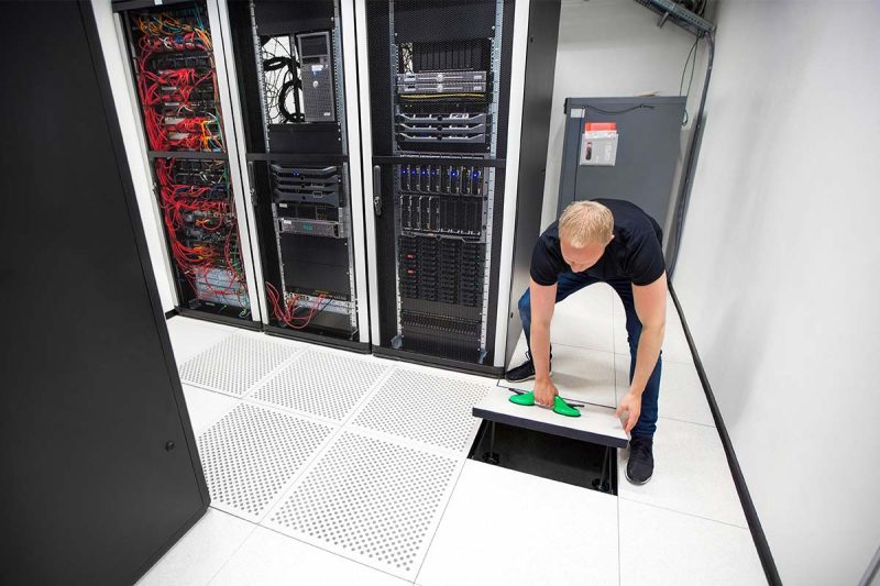 Man in need of raised access floor panel identification services